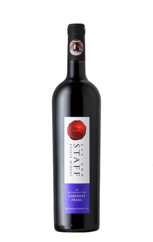 Wine bottle with a label on a white background