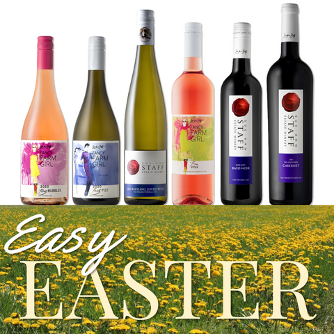 Assorted wine bottles with colorful labels on a grassy field background with 'Easy Easter' text.