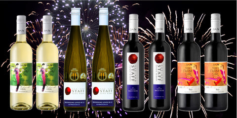 The May Two-Four wine pack: a photo of eight bottles of wine superimposed over the image of fireworks. 