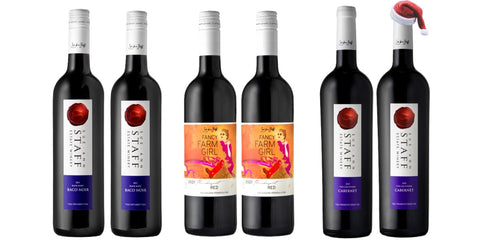 Six bottles of wine on a white background