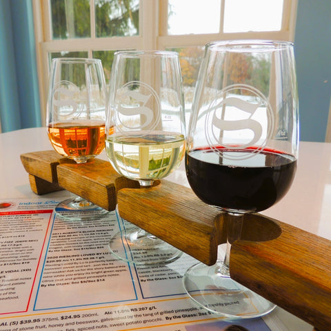 photo of three wine glasses with about 2 oz of wine in each one